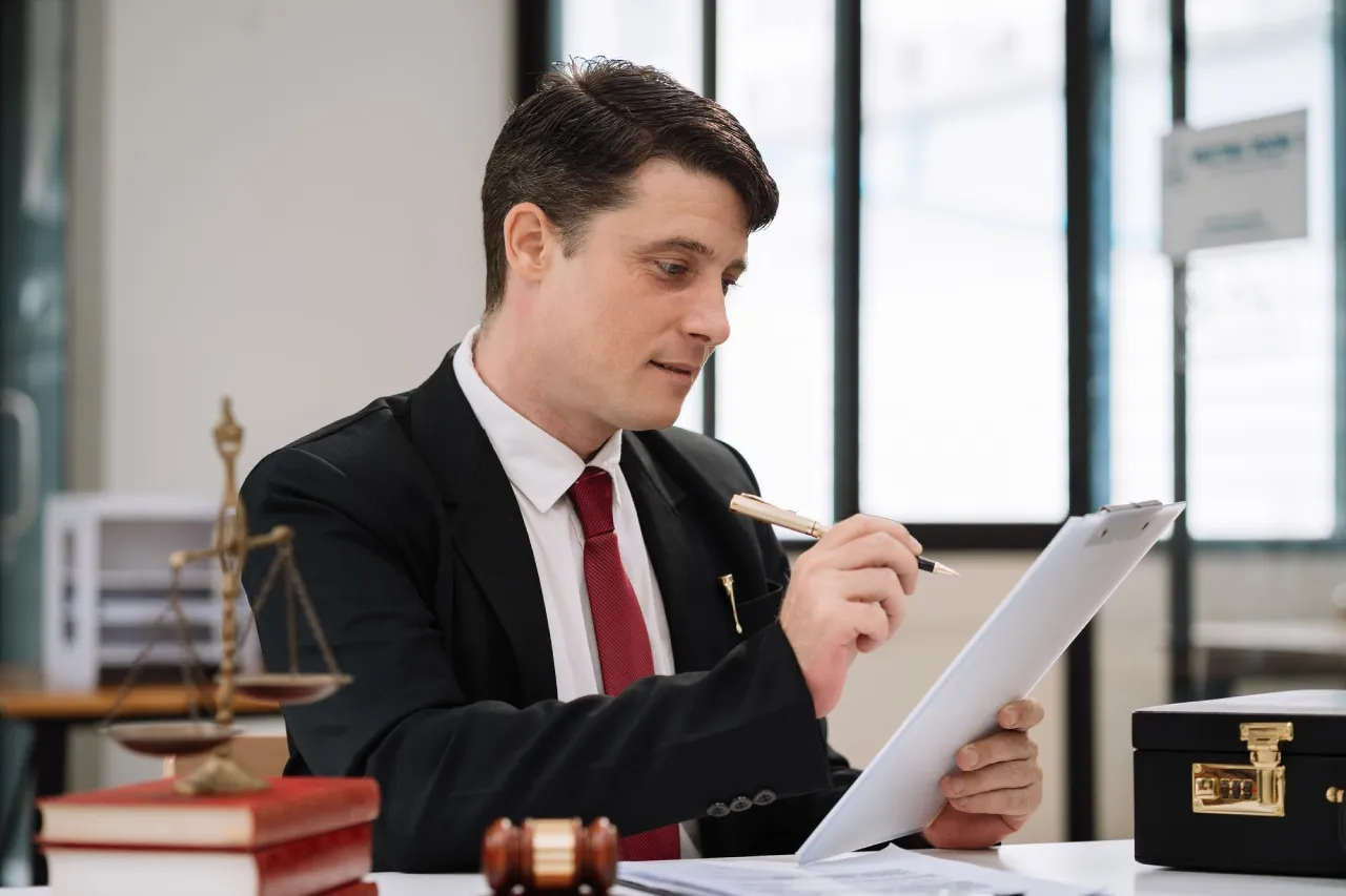 Professional claims investigator analyzing evidence and protecting company integrity.